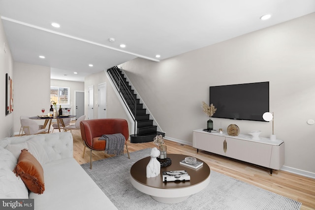 1728 S Bancroft St, Philadelphia, PA 19145 - living room featuring stairs, wood finished floors, baseboards, and recessed lighting