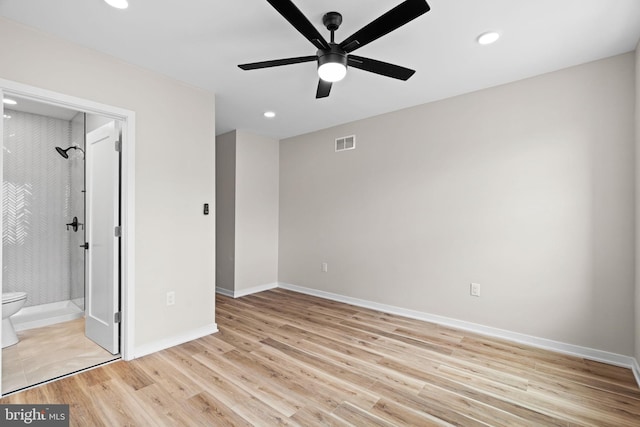 1728 S Bancroft St, Philadelphia, PA 19145 - unfurnished bedroom with light wood-style floors, baseboards, recessed lighting, a ceiling fan, and ensuite bath