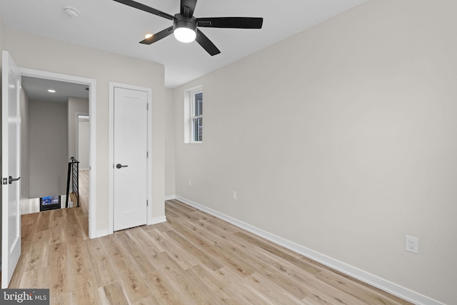 1728 S Bancroft St, Philadelphia, PA 19145 - unfurnished bedroom with light wood finished floors, baseboards, and a ceiling fan