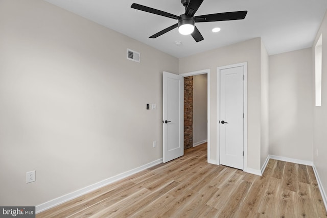 1728 S Bancroft St, Philadelphia, PA 19145 - unfurnished bedroom featuring baseboards, light wood-style floors, and a ceiling fan