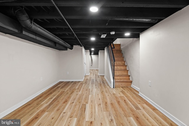 1728 S Bancroft St, Philadelphia, PA 19145 - finished below grade area featuring wood finished floors, stairs, and baseboards