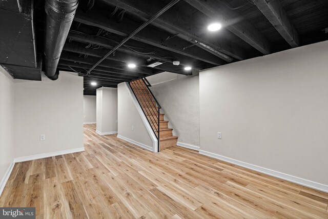 1728 S Bancroft St, Philadelphia, PA 19145 - finished basement featuring baseboards, wood finished floors, and stairs