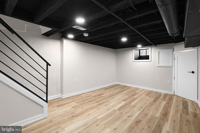 1728 S Bancroft St, Philadelphia, PA 19145 - basement featuring stairway, light wood-type flooring, and baseboards