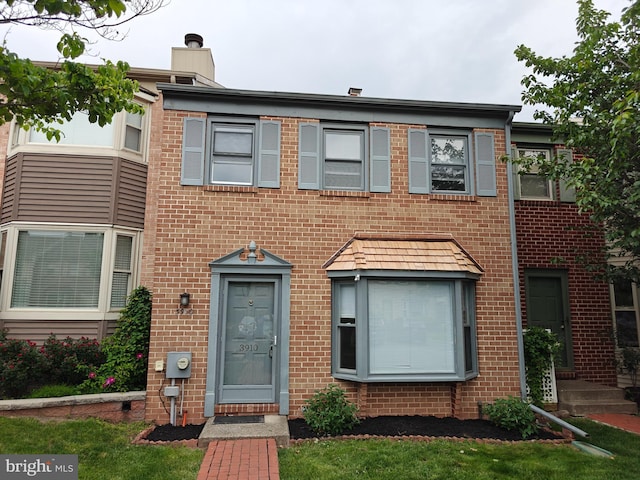 3910 Gatehouse Ln, Skippack, PA 19474 - view of property with brick siding and a chimney