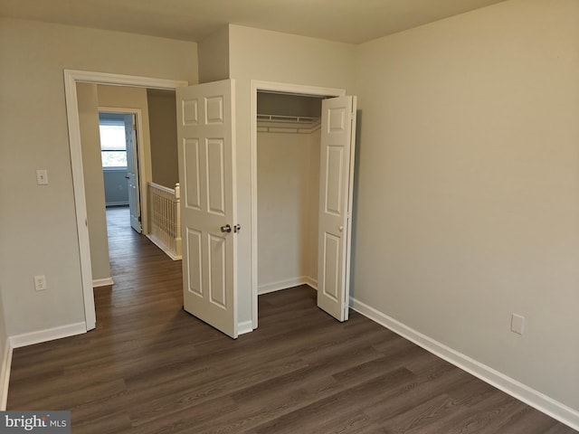 3910 Gatehouse Ln, Skippack, PA 19474 - unfurnished bedroom with dark wood finished floors, baseboards, and a closet
