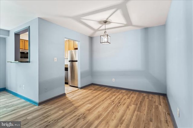 116 Lee Ave Unit 112, Takoma Park, MD 20912 - unfurnished dining area featuring light wood-type flooring and baseboards