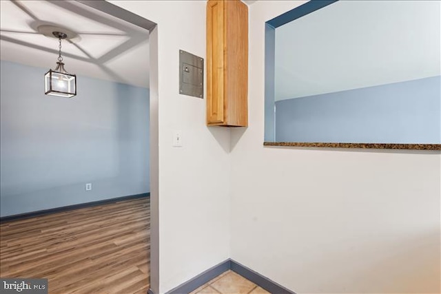 116 Lee Ave Unit 112, Takoma Park, MD 20912 - hallway featuring baseboards, electric panel, and wood finished floors