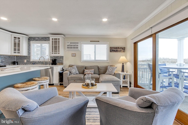 6801 Atlantic Ave Unit 2, Ocean City, MD 21842 - living room featuring light wood-style flooring, crown molding, plenty of natural light, and recessed lighting