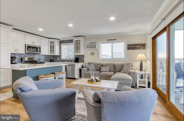6801 Atlantic Ave Unit 2, Ocean City, MD 21842 - living area featuring ornamental molding, light wood finished floors, and recessed lighting