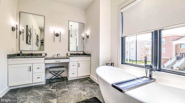 21 Hart Ln, Ventnor City, NJ 08406 - full bath featuring vanity, a freestanding tub, baseboards, and marble finish flooring