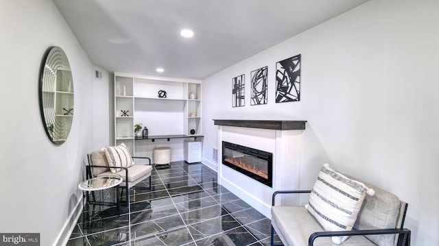 21 Hart Ln, Ventnor City, NJ 08406 - living area featuring a glass covered fireplace, dark marble finish flooring, recessed lighting, and baseboards