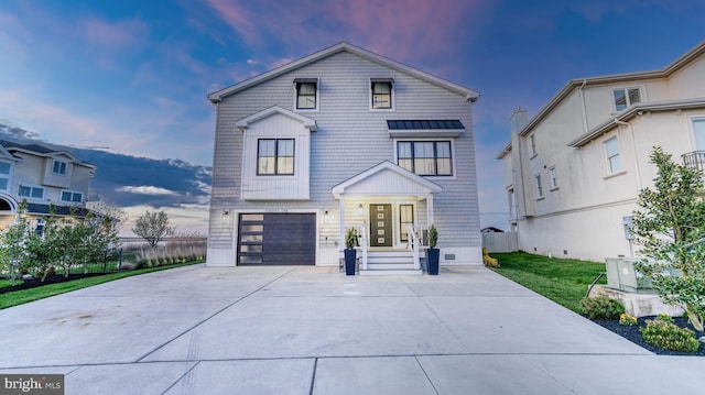 21 Hart Ln, Ventnor City, NJ 08406 - view of front of home featuring driveway and a garage
