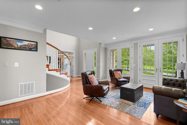 8800 Primula Dr, Laytonsville, MD 20882 - living room featuring stairs, ornamental molding, hardwood / wood-style flooring, recessed lighting, and baseboards