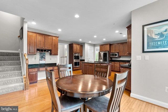 8800 Primula Dr, Laytonsville, MD 20882 - dining space featuring light wood finished floors, stairway, baseboards, and recessed lighting