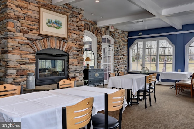 3046 Cider House Rd, Toano, VA 23168 - dining space with beamed ceiling, healthy amount of natural light, and carpet