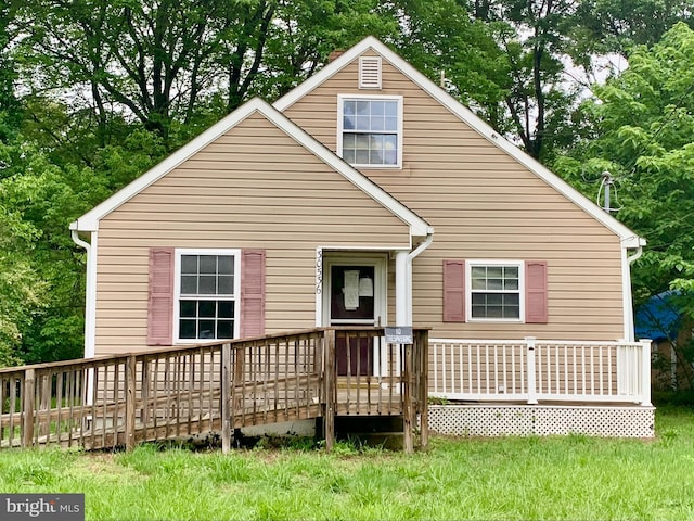 30536 Bennett Rd, Salisbury, MD 21804 - back of house featuring a deck and view of scattered trees