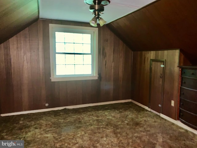 30536 Bennett Rd, Salisbury, MD 21804 - bonus room with lofted ceiling, wooden walls, and carpet flooring