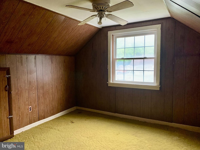 30536 Bennett Rd, Salisbury, MD 21804 - additional living space with wood walls, lofted ceiling, ceiling fan, and light carpet