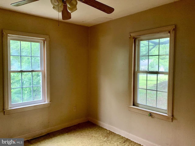 30536 Bennett Rd, Salisbury, MD 21804 - unfurnished room featuring healthy amount of natural light, a ceiling fan, and light colored carpet
