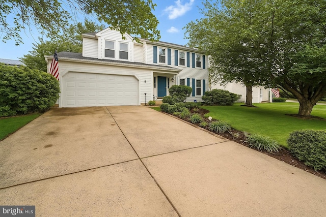26 Spring Lake Dr, Stafford, VA 22556 - traditional-style home with a front lawn and concrete driveway