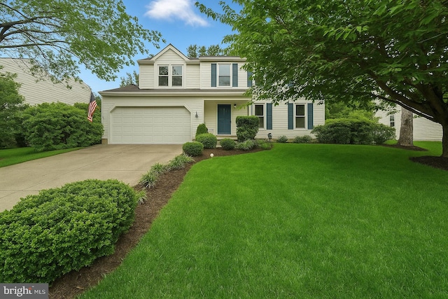 26 Spring Lake Dr, Stafford, VA 22556 - traditional-style house with concrete driveway, an attached garage, and a front lawn