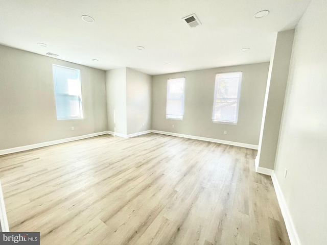 6227 Callowhill St, Philadelphia, PA 19151 - empty room featuring plenty of natural light, light wood-style floors, and baseboards