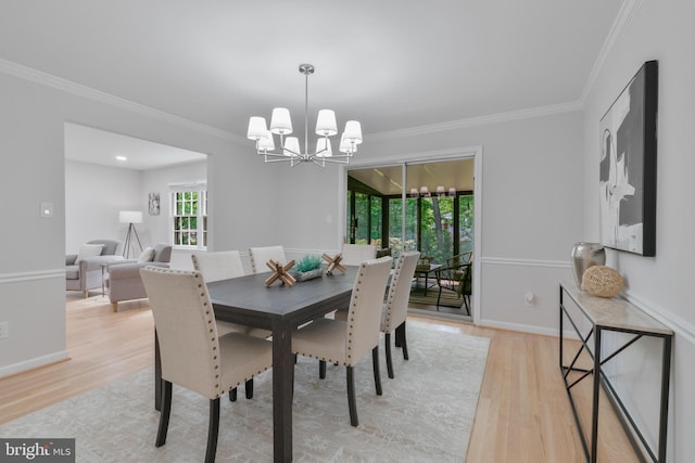 1334 Elsinore Ave, Mclean, VA 22102 - dining area featuring a chandelier, light wood-style flooring, ornamental molding, and baseboards