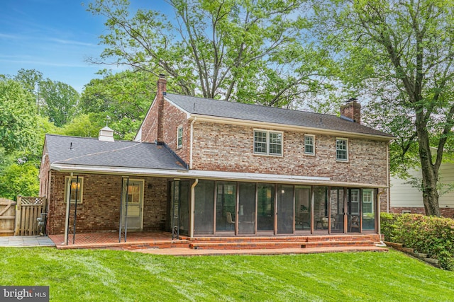 1334 Elsinore Ave, Mclean, VA 22102 - rear view of house with a chimney, a sunroom, brick siding, a gate, and roof with shingles