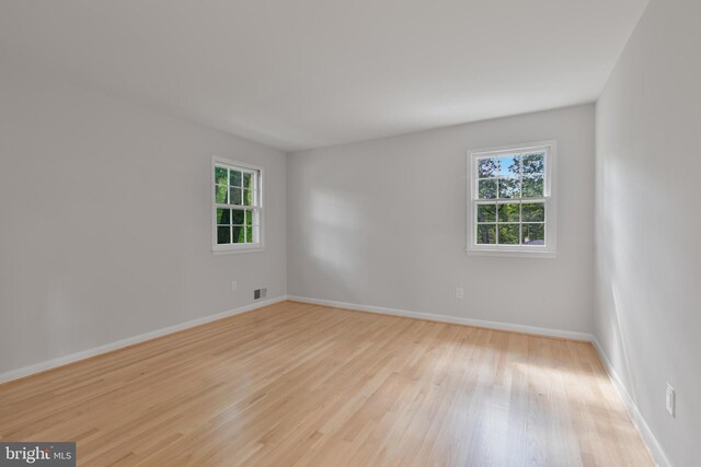 1334 Elsinore Ave, Mclean, VA 22102 - unfurnished room with wood finished floors and baseboards