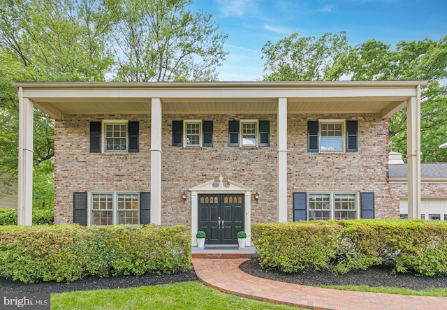 1334 Elsinore Ave, Mclean, VA 22102 - view of front of house with brick siding and covered porch