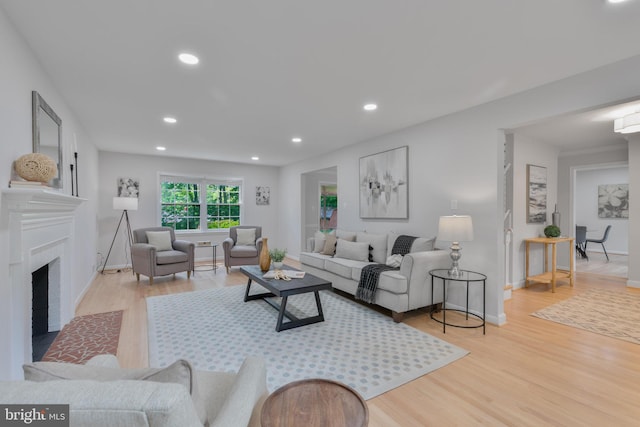 1334 Elsinore Ave, Mclean, VA 22102 - living room featuring light wood-style floors, baseboards, recessed lighting, and a fireplace