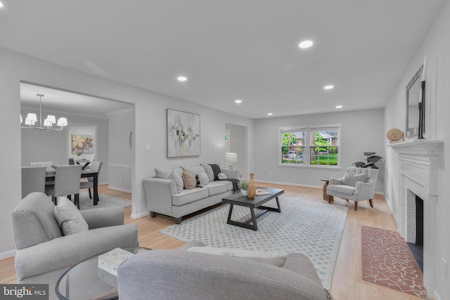 1334 Elsinore Ave, Mclean, VA 22102 - living room with light wood-type flooring, a fireplace with flush hearth, a chandelier, recessed lighting, and baseboards