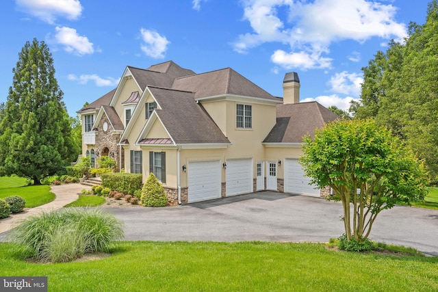 2860 Pfefferkorn Rd, West Friendship, MD 21794 - view of front of property with stone siding, stucco siding, driveway, a garage, and a shingled roof