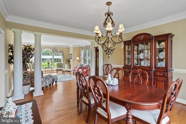 2860 Pfefferkorn Rd, West Friendship, MD 21794 - dining room with ornamental molding, light wood-style floors, a chandelier, and ornate columns