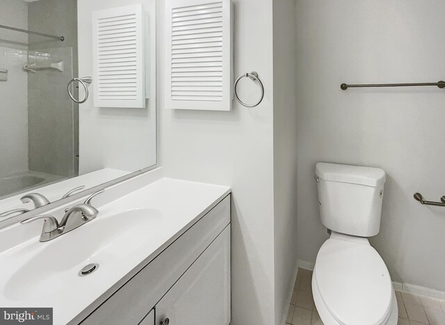 13109 Mica Ct, Silver Spring, MD 20904 - full bath with toilet, vanity, baseboards, and tile patterned flooring