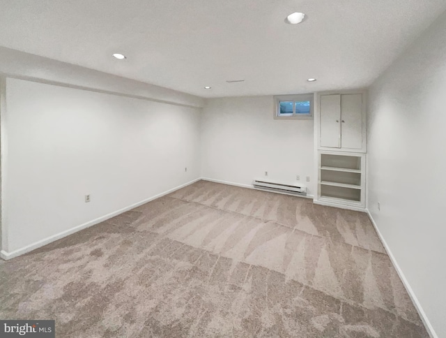 13109 Mica Ct, Silver Spring, MD 20904 - finished below grade area featuring a baseboard radiator, carpet floors, recessed lighting, and baseboards