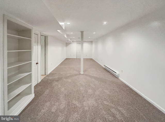 13109 Mica Ct, Silver Spring, MD 20904 - finished below grade area with baseboard heating, carpet flooring, baseboards, and recessed lighting