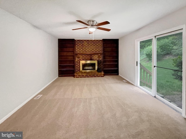 13109 Mica Ct, Silver Spring, MD 20904 - unfurnished living room featuring built in features, baseboards, ceiling fan, carpet, and a brick fireplace