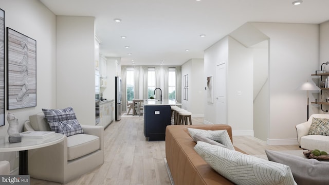 42096 Picasso Sq, Ashburn, VA 20148 - living room with light wood-style floors and recessed lighting
