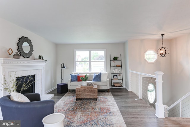 1667 Beech Ln, Hanover, PA 17331 - living area with wood finished floors, a glass covered fireplace, and baseboards