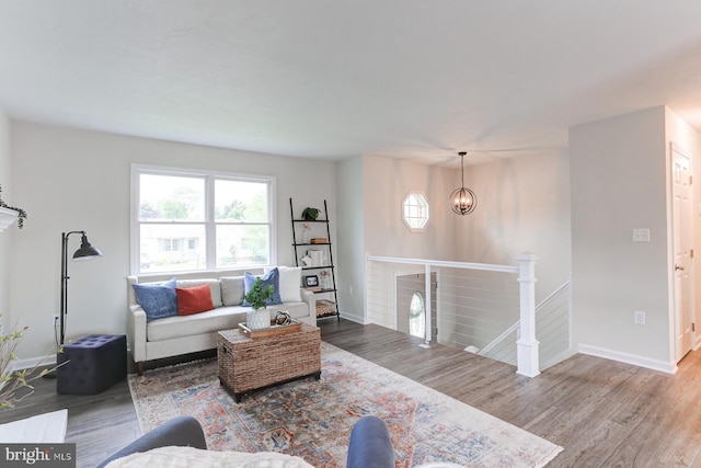 1667 Beech Ln, Hanover, PA 17331 - living area with wood finished floors, baseboards, and a chandelier