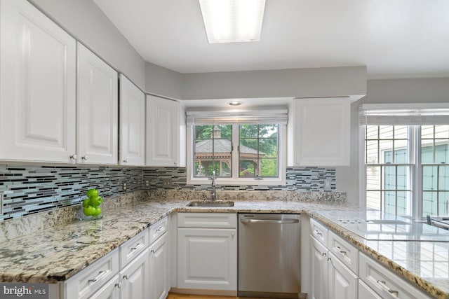 9710 Magledt Rd, Baltimore, MD 21234 - kitchen with dishwasher, white cabinets, decorative backsplash, and light stone counters