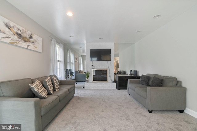9710 Magledt Rd, Baltimore, MD 21234 - carpeted living room with a brick fireplace and recessed lighting