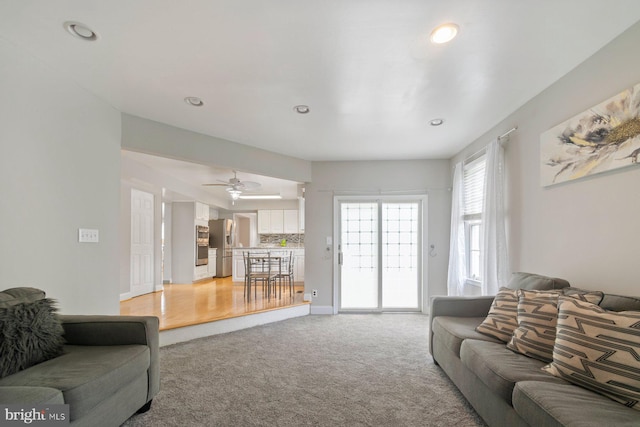 9710 Magledt Rd, Baltimore, MD 21234 - living area featuring light carpet, recessed lighting, and a ceiling fan