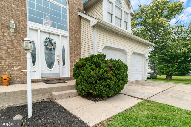 9710 Magledt Rd, Baltimore, MD 21234 - doorway to property featuring a garage and concrete driveway