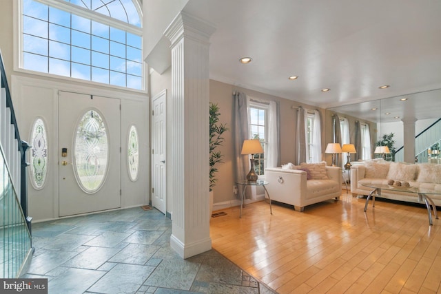 9710 Magledt Rd, Baltimore, MD 21234 - entryway with ornate columns, stairway, and recessed lighting