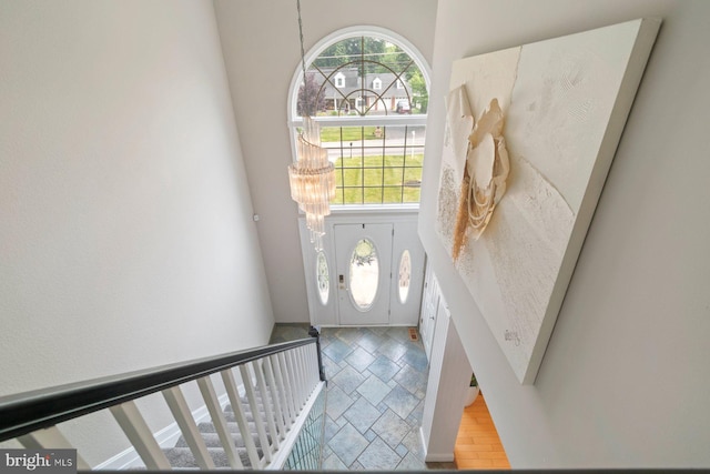 9710 Magledt Rd, Baltimore, MD 21234 - entrance foyer featuring a chandelier and stone finish floors
