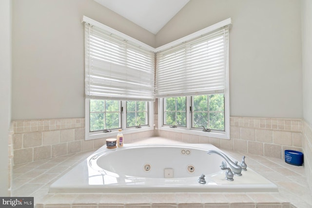 9710 Magledt Rd, Baltimore, MD 21234 - full bathroom featuring healthy amount of natural light, a whirlpool tub, and lofted ceiling