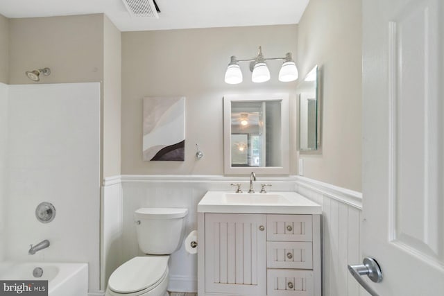 9710 Magledt Rd, Baltimore, MD 21234 - full bath featuring a wainscoted wall, vanity, and shower / bath combination