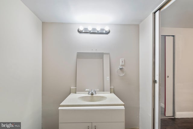 9710 Magledt Rd, Baltimore, MD 21234 - bathroom featuring vanity and wood finished floors